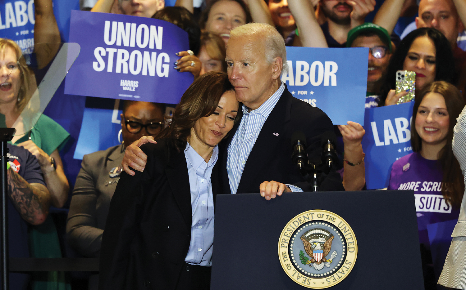 Joe Biden embraces Kamala Harris at a campaign event in Pittsburgh, his first since bowing out of the presidential race and endorsing Harris.