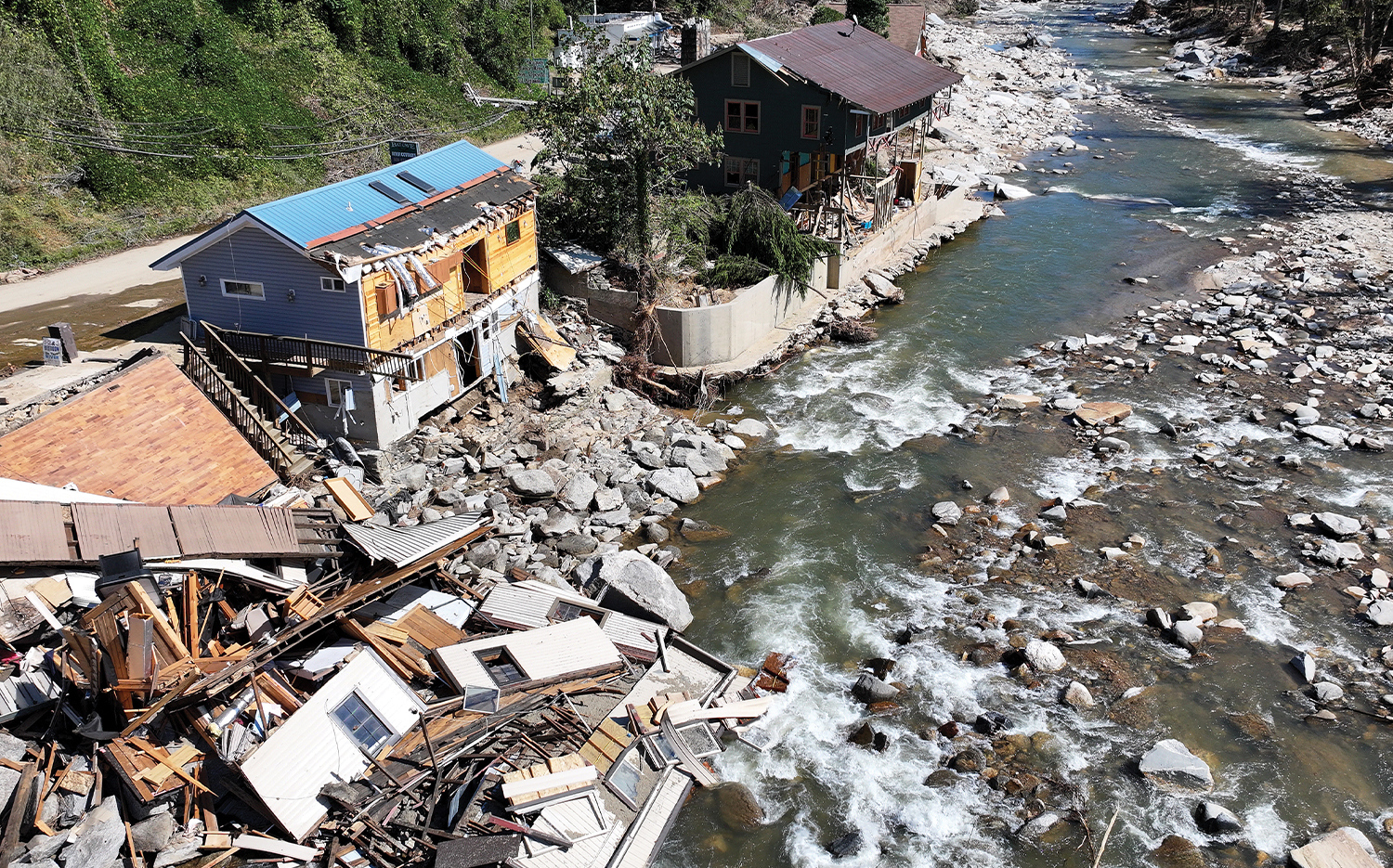 Aerial view of destroyed and damaged buildings in the aftermath of Hurricane Helene flooding in Bat Cave (near Chimney Rock), N.C.